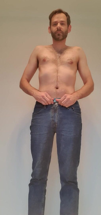 Clinton strips from dressed to nude
