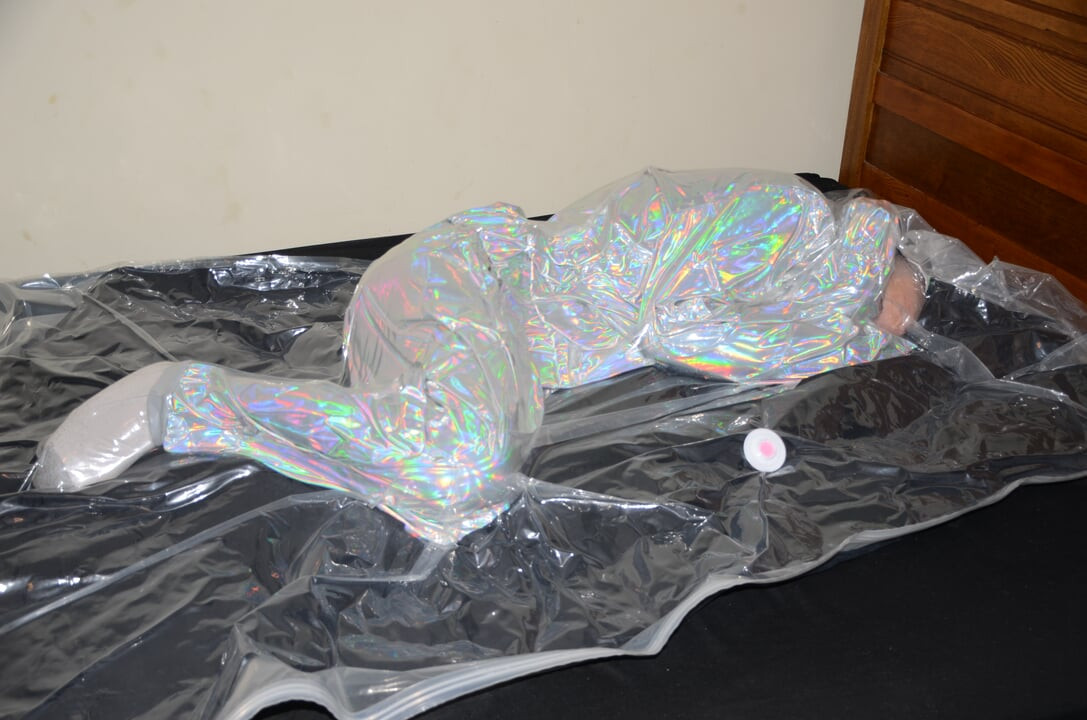 Dec 18 2022 - VacPacked in Mr Riegillio shiny PVC tracksuit with PVC aprons & face shield