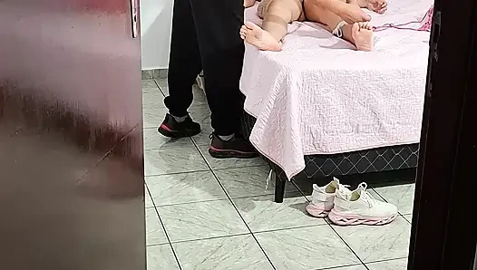 Stepfather helps stepdaughter take off her clothes to go to bed.