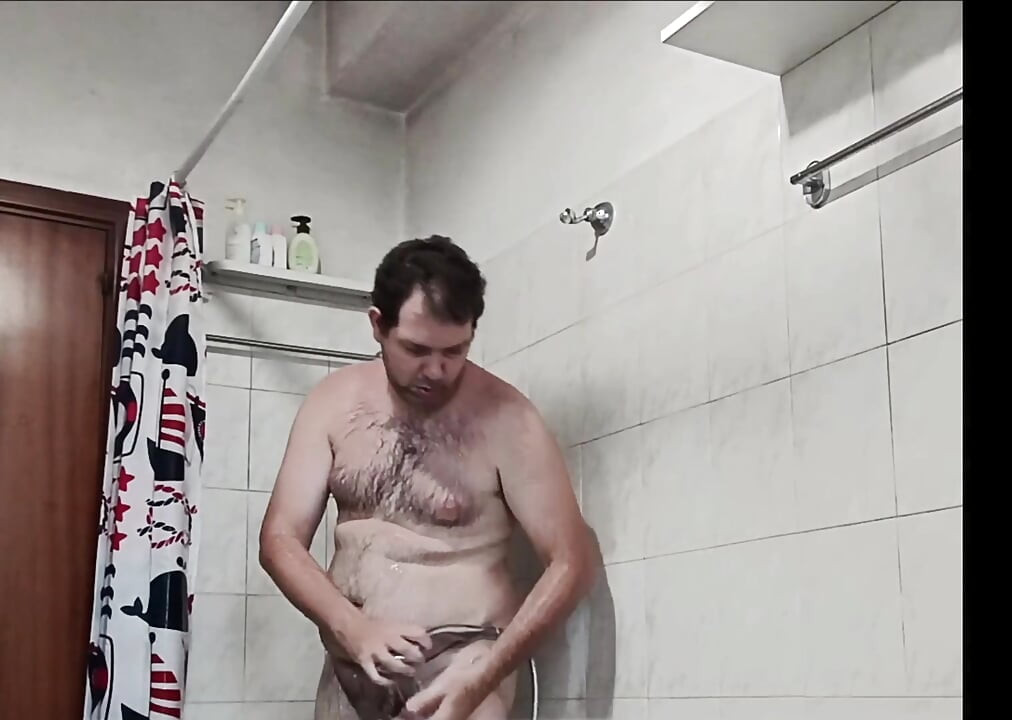 Naked boy in the shower