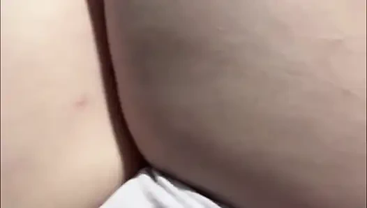 Cute girl pisses in a bottle and pours it back into her pussy