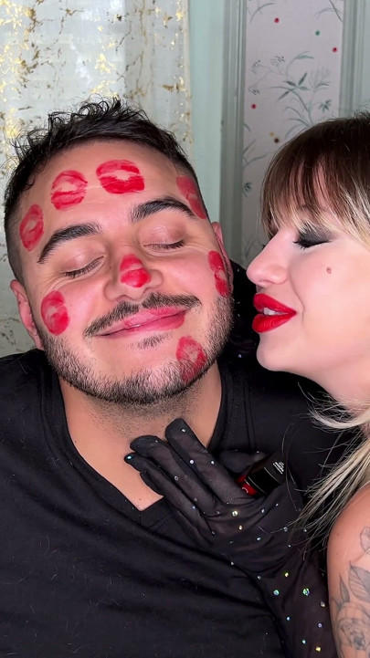 Red Lipstick Kisses Cover His Entire Face