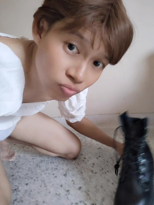 Asian femboy licking boots and playing with himself. Anyone want her to lick anything else?