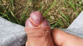 Outdoor tied cock and cum