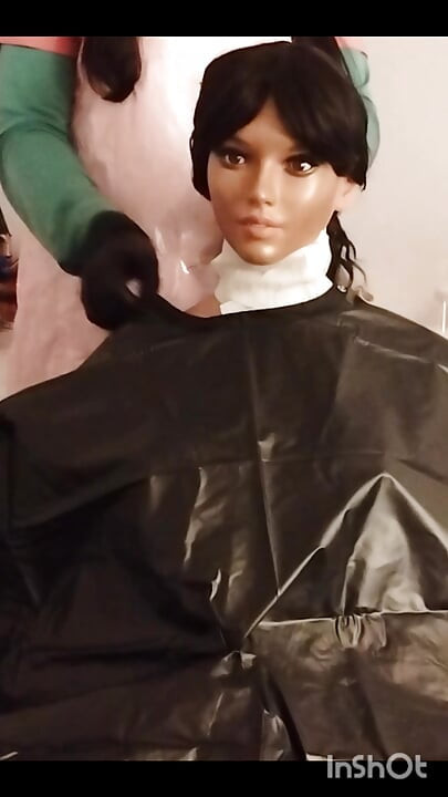 Ebony Sex doll Nikki shows off vinyl shampoo capes