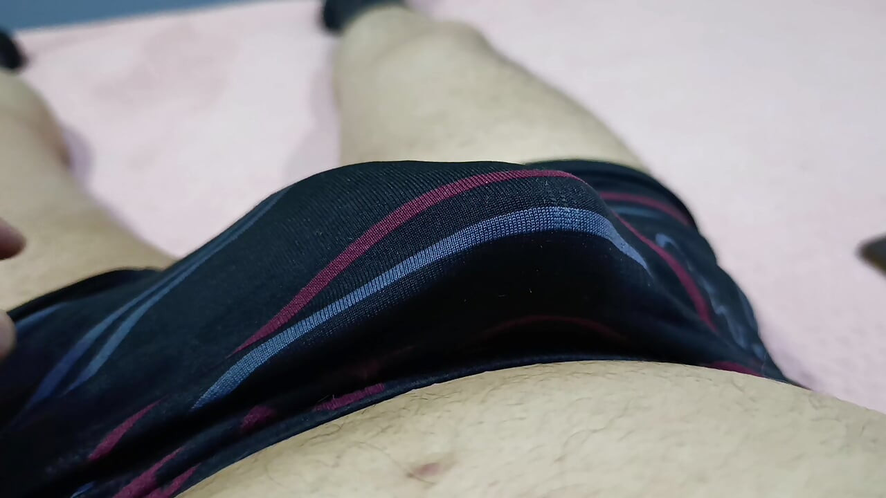 I massage my big cock on the hotel bed at night to really relax.