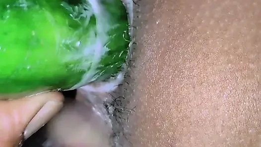 Pooja put his hand in his wife's pussy and inserted cucumber hot.