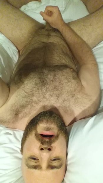 Sexy bear masterbates and jerks until he shoots a huge load all over his hairy chest