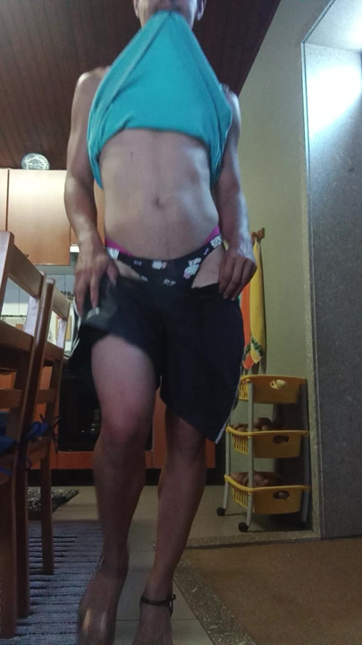 Hello kitty thong slut with high heels parading in the kitchen prancing her horny ass
