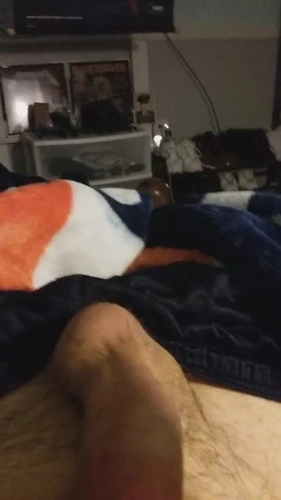 Masturbating