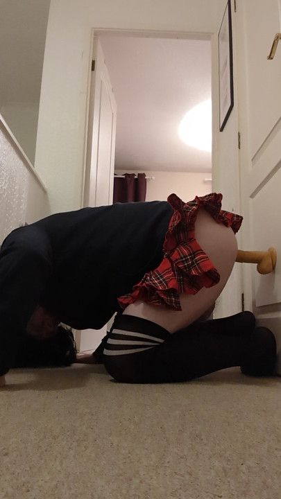 Sissy fucks herself on toy
