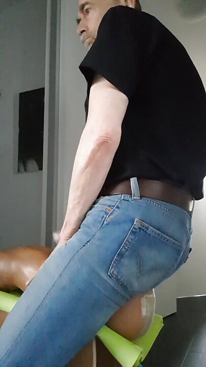 My jeans-butt riding the face of my sitting-doll