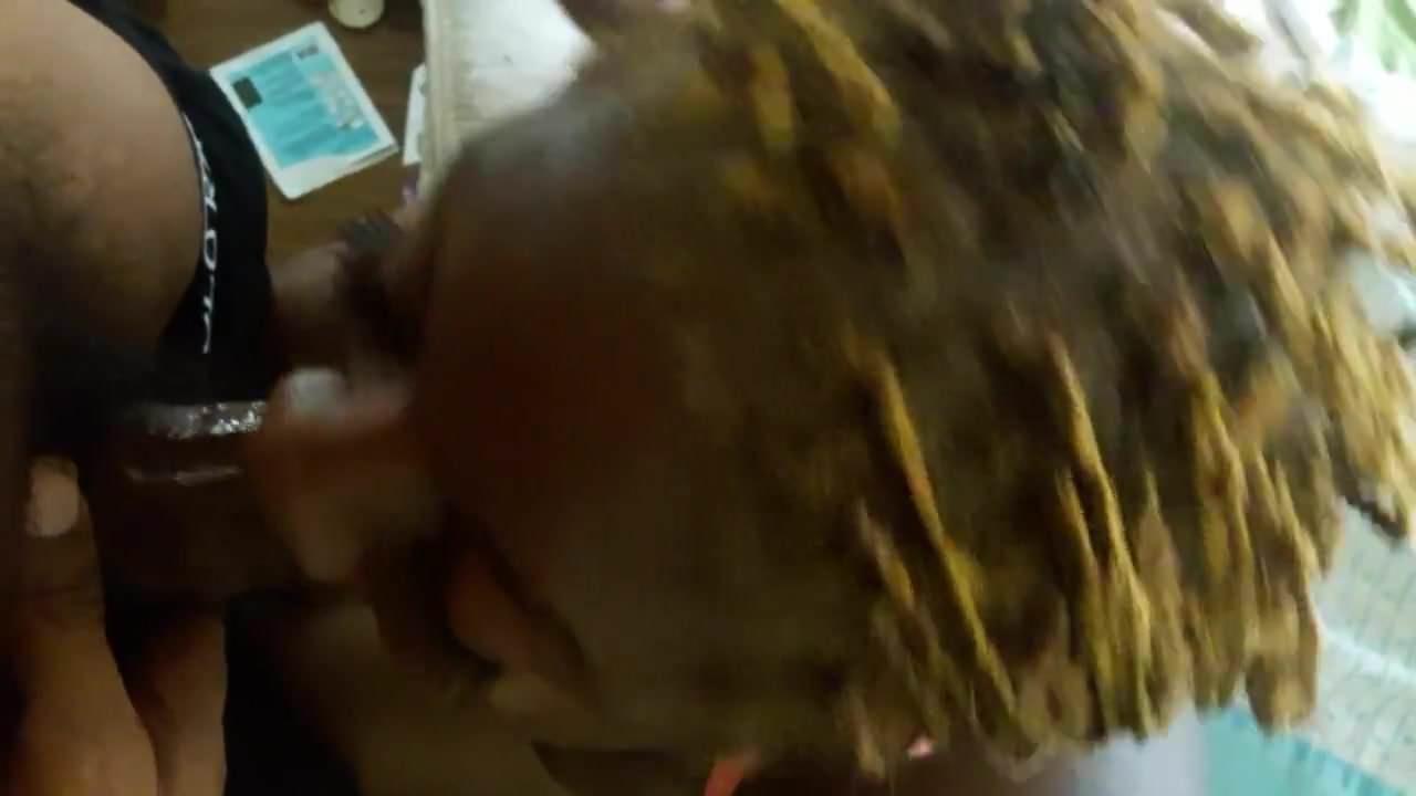 Black MILF giving head - POV