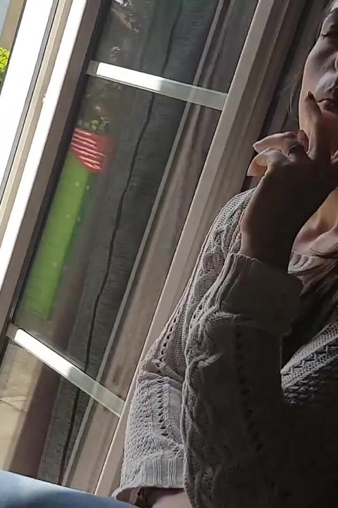 Gorgeous brunette teasing everyone with her smoking