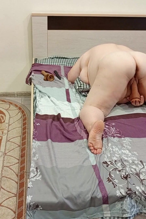 A Big Dildo in the Fleshy Pussy of a Mother-in-law