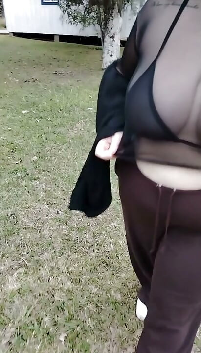My stepmother walking in a transparent T-shirt.