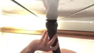 In stockings with a dildo in my ass