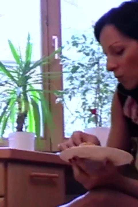 Lady makes her pet eat off the flor
