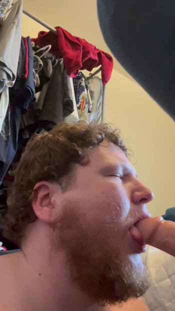 Sucking on a bigger Dilldo
