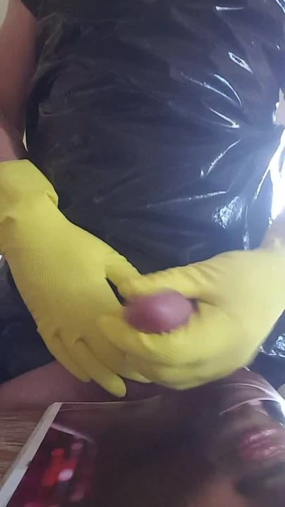 Handjob yellow rubber gloves