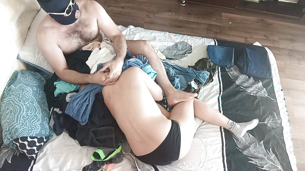 Sensual massage of a sexy couple with oil on the body.