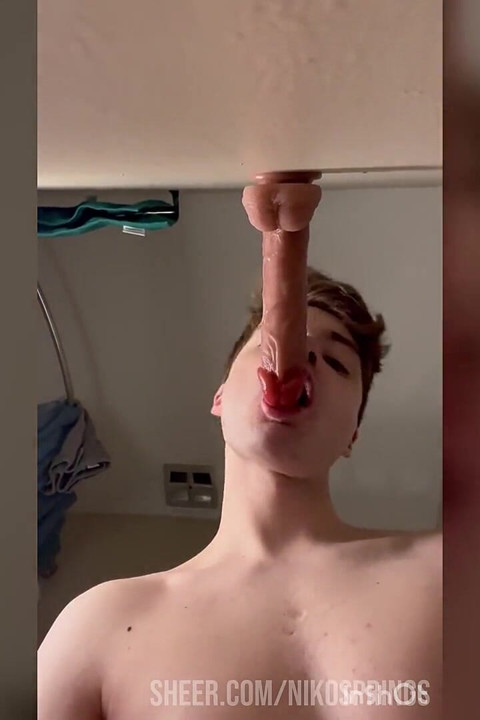 Cock Hungry Twink Slobbers on Giant Dildo!