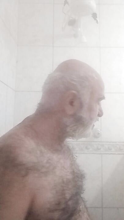 HAIRY BRUTE TAKING A SHOWER
