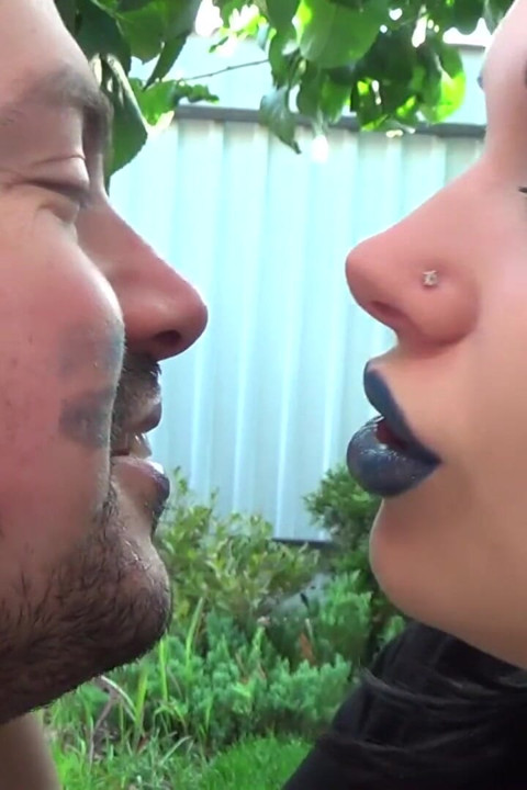 Covering Alex with blue shiny lipstick kisses all over his face outdoor! + Little tongue play!