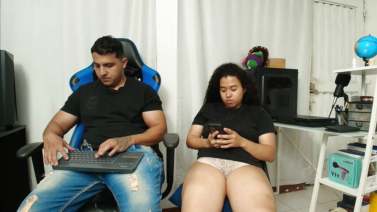 The whore masturbates in the office