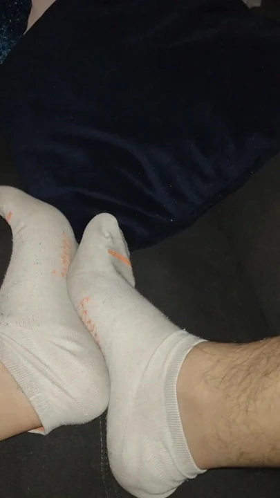 old worn white stockings ( male feet)