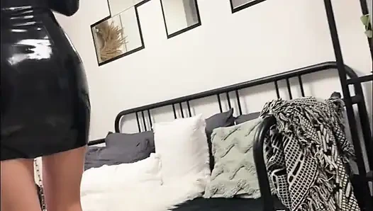 Latex maid service in high heels and chains