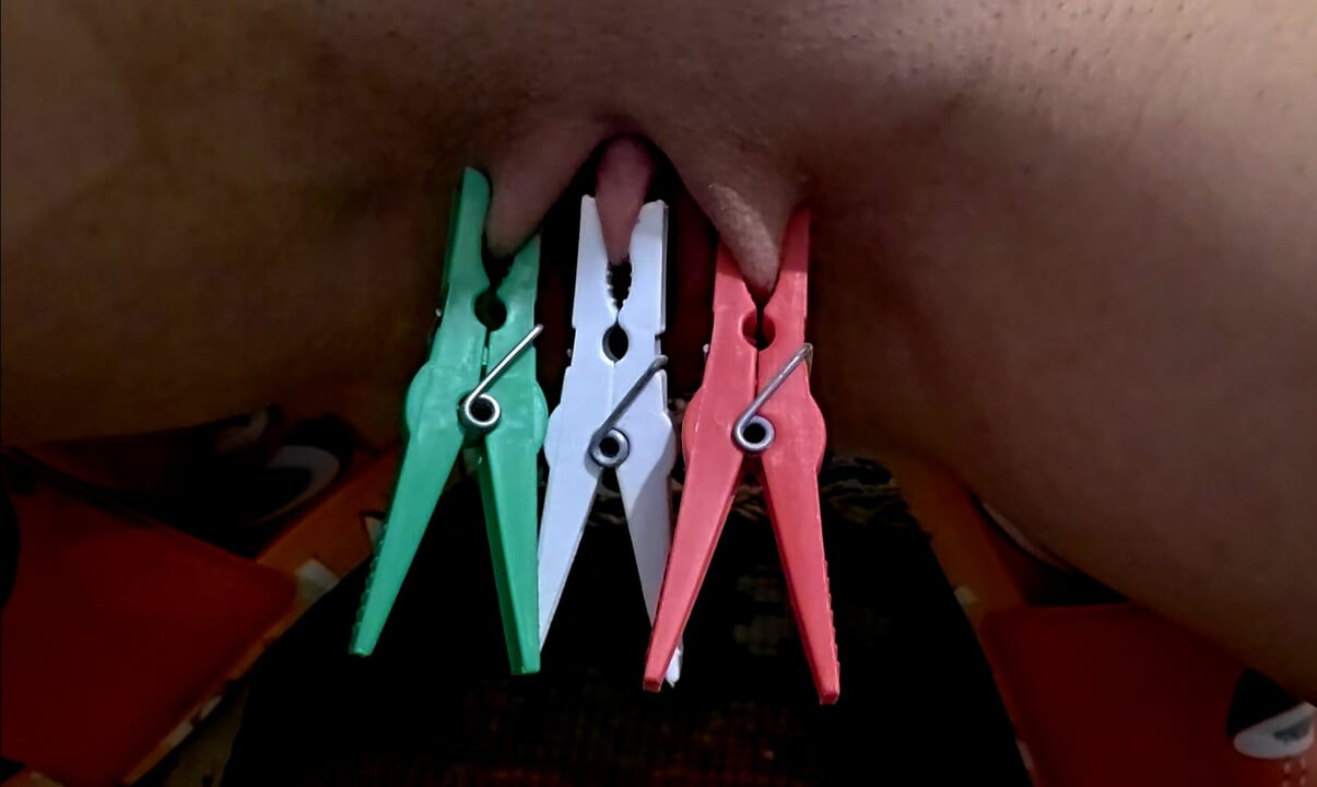 Ana Liz tortures and stretches her tight pussy with tweezers in close-up...