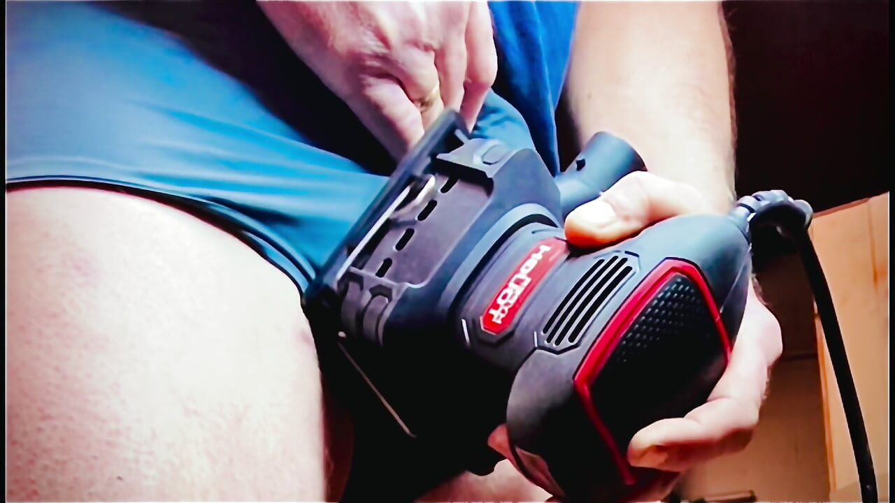 Watch his cock cum all over a wood sander