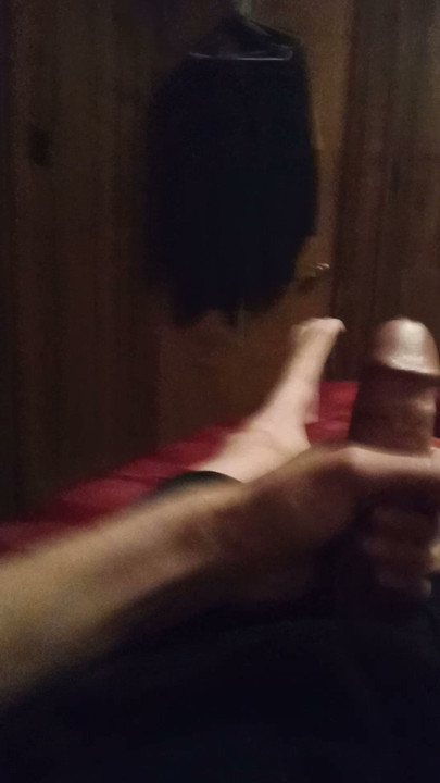 Me stroking my cock showing my long legs and feet