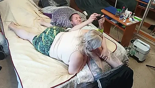 the game of the console ended with a blowjob from the stepmom with swallowing sperm