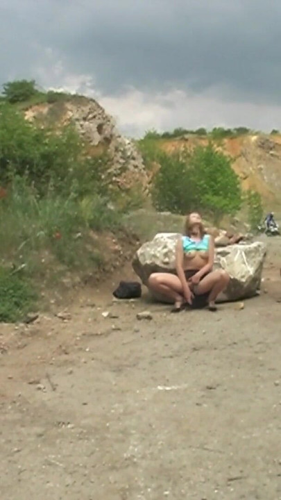 Must-see moment from "Hot big busty girl masturbates in a stone quarry and gets caught by several motorbikers"