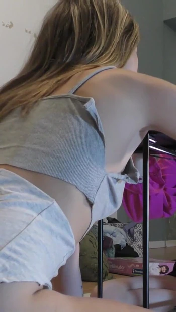 Emotional moment from "Two Girl play Mini Bowling Game without any Underwear or Bra"