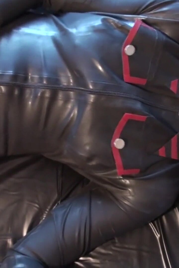 Latex Danielle masturbating in army catsuit