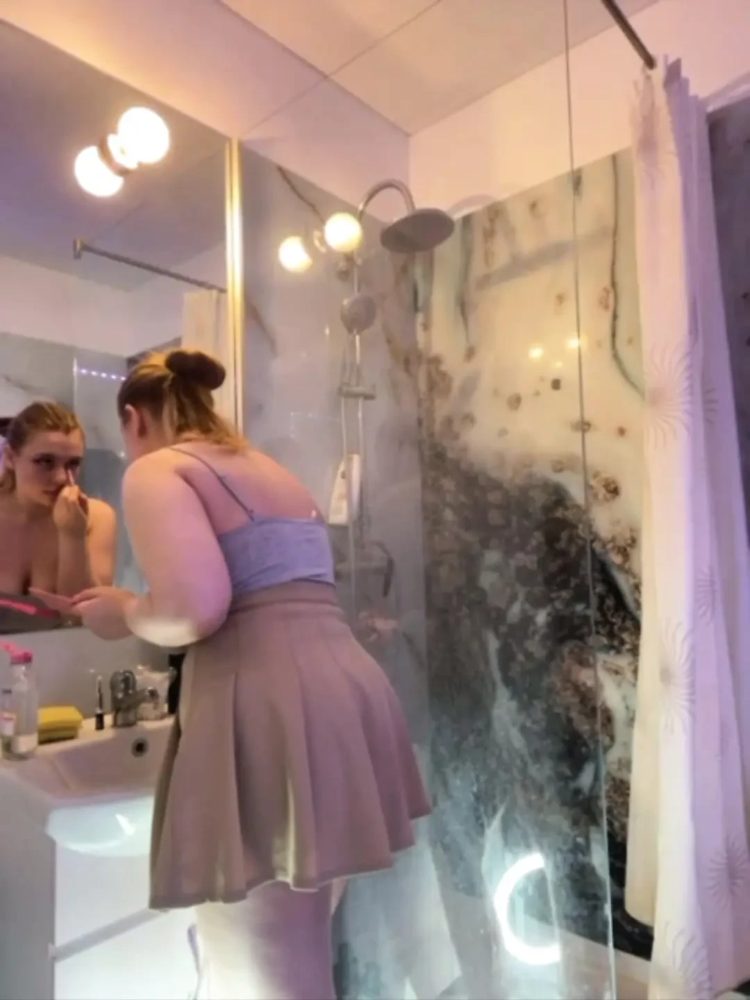 A whore slips into the toilet to use a remote-controlled dildo vibrator