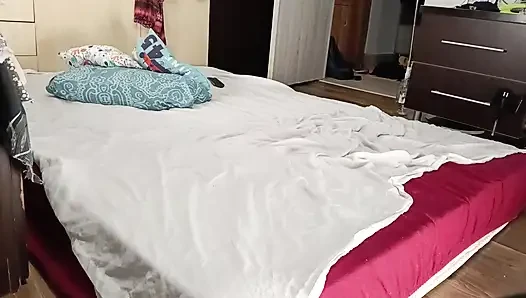 Sexy brunette doing naked chores around the house.