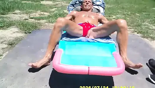 SUN TANNING AND THE COCK LOVES IT