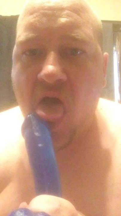 Me sucking on blue dildo