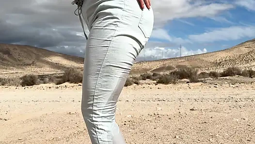 Girl can't hold pee and wet her pants on the public road