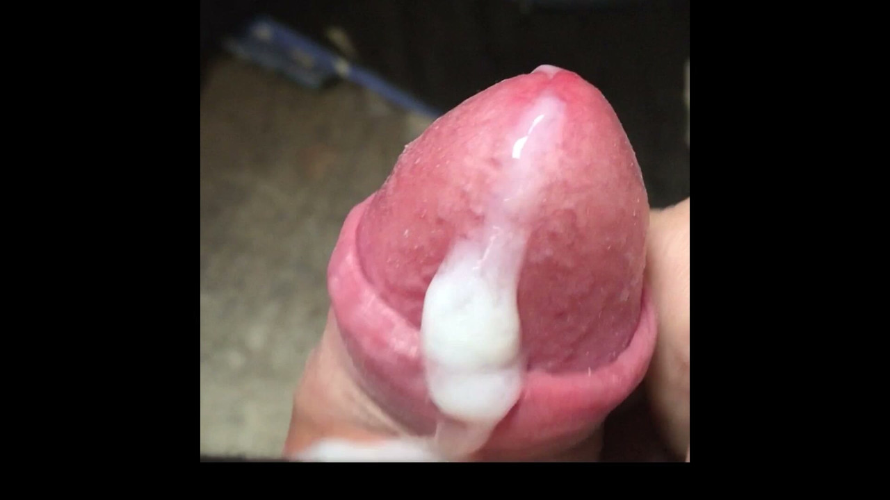 close up of uncut cock spunking
