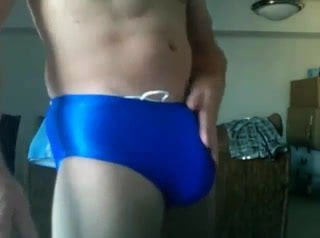 show off in speedo hard for me while I fuck myself