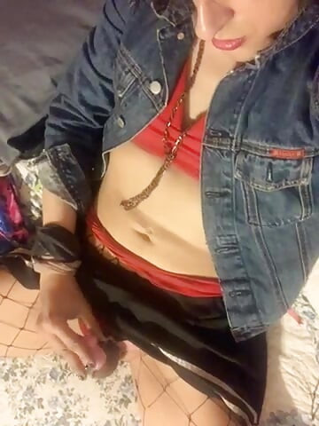 Cute Latina Transgirl in Fishnets & Red Heels Puts On Small Pink Leashed Chastity & Sucks Dildo, As Usual