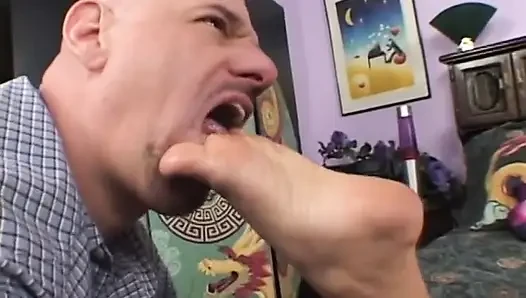 Cocksucker squirts then licks creampie on her toes