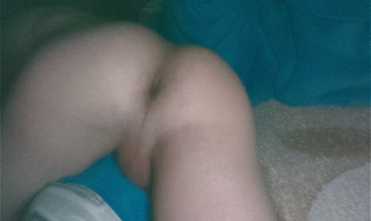 On all fours in bed