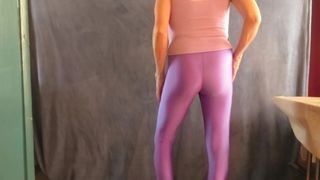 CD slut models tight spandex leggings.