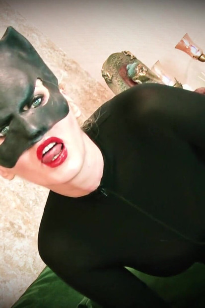 Batman trapped into Catwoman boots worship